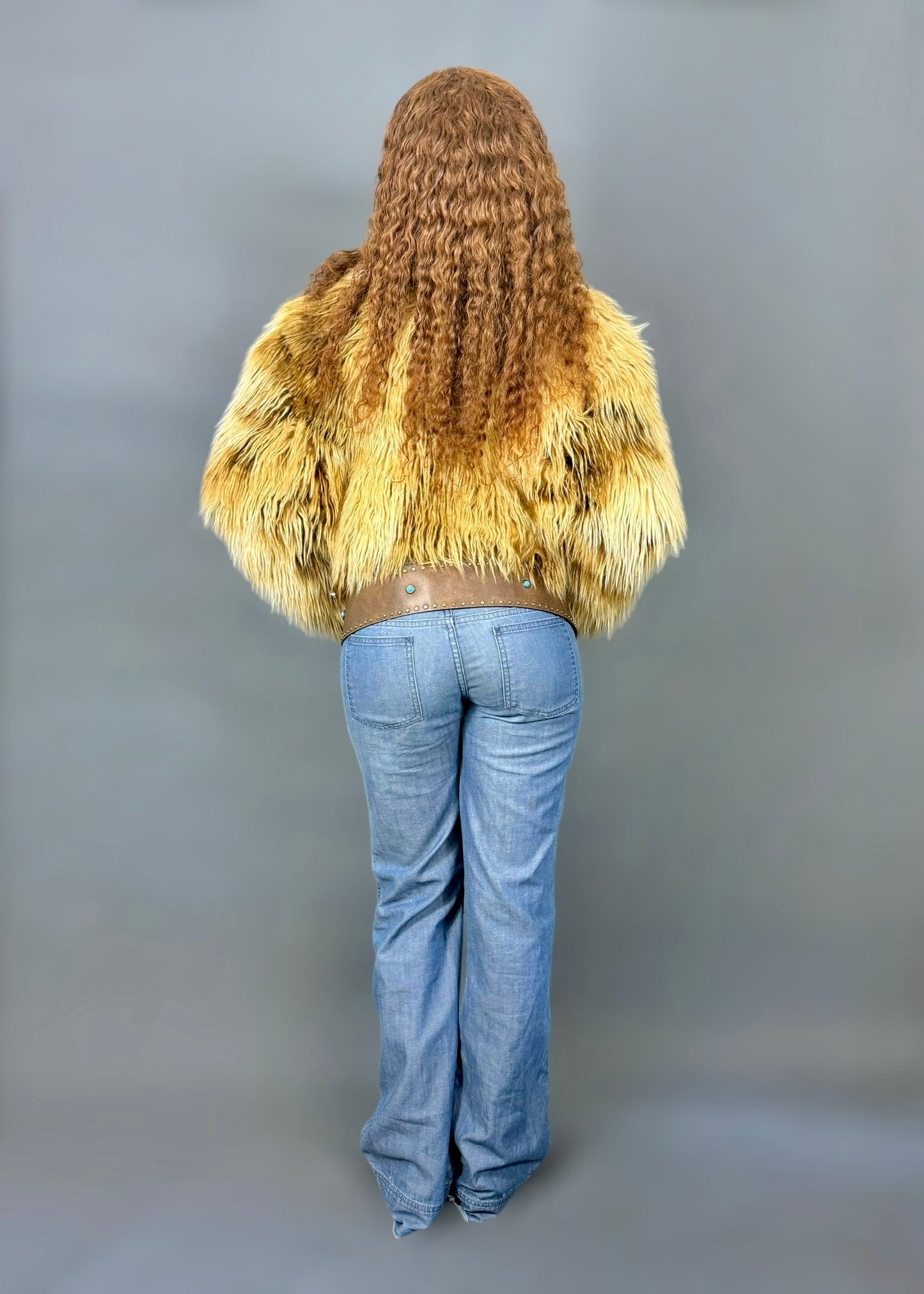 Veste courte en fausse fourrure