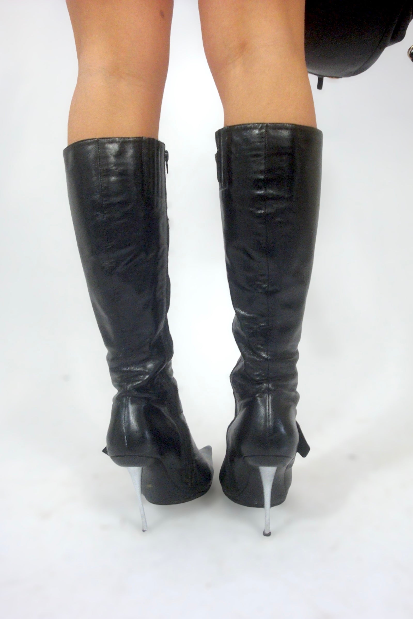 Bottes pointues à talons en metal