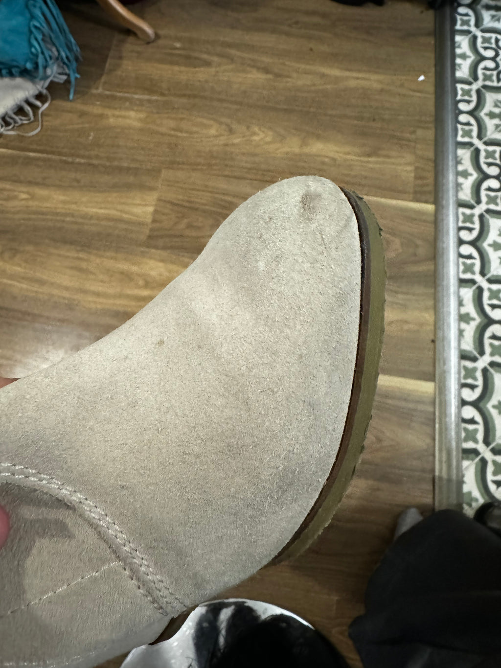 Bottes à franges et talons compensés