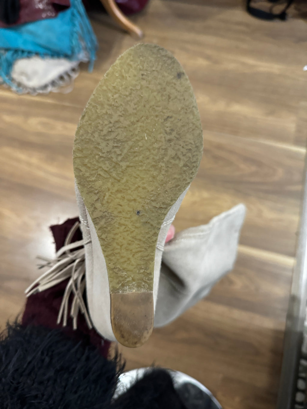 Bottes à franges et talons compensés