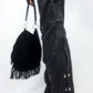 Chaps en cuir noir