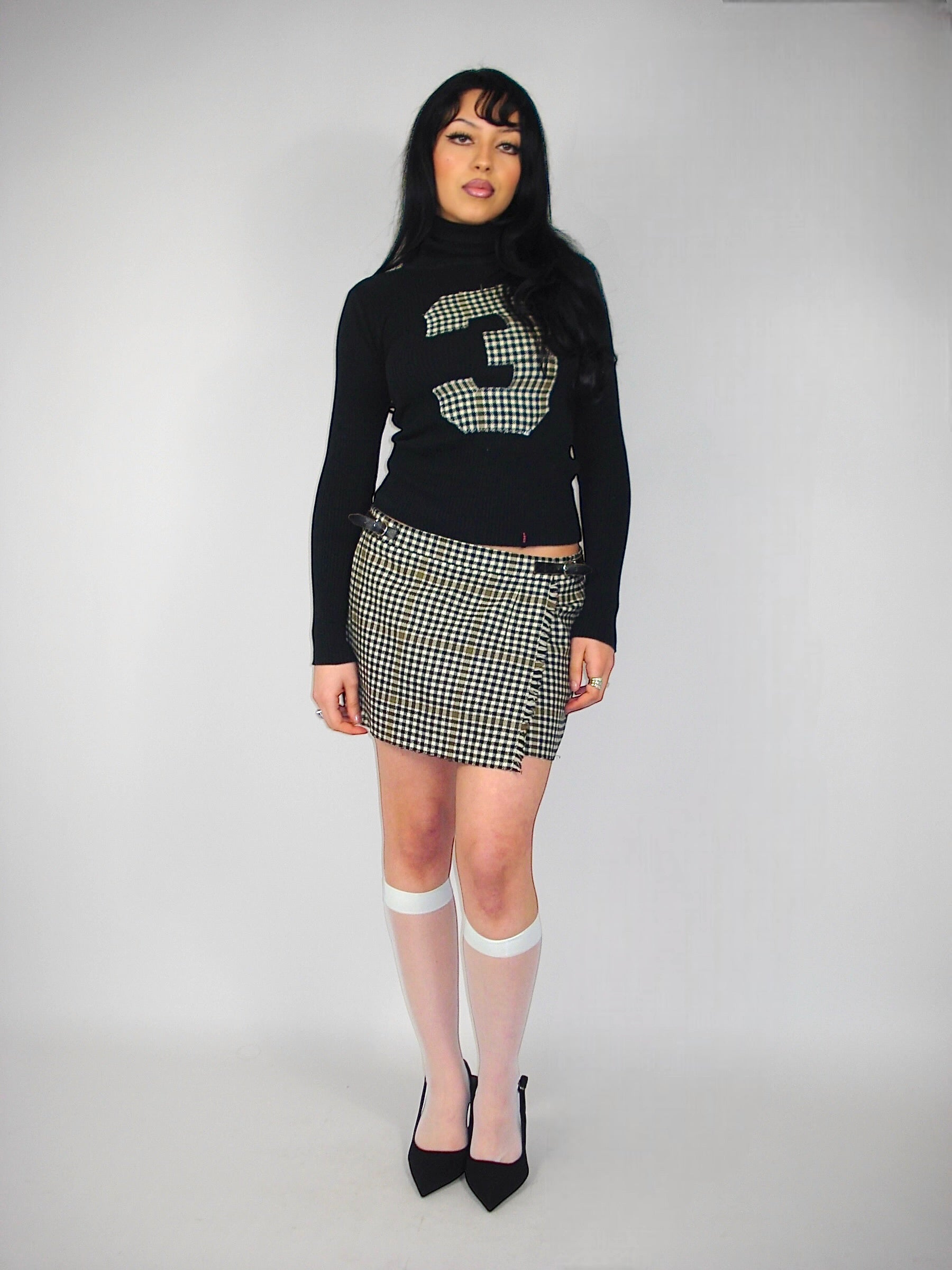 Ensemble pull + mini jupe à carreaux