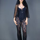 Pantalon flare en dentelle noire