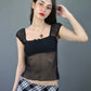 Top Babydoll en mesh noir